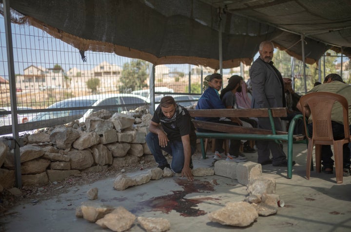 Palestinians gather at the community of Umm Al-Khair near Hebron in the West Bank to pay their respects and mourn the killing of Awdah Al-Hathaleen, who was shot by an Israeli settler the previous day, on July 29, 2025.