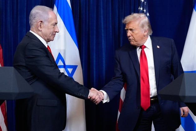 President Donald Trump shakes hands with Israel's Prime Minister Benjamin Netanyahu at the end of a news conference at Mar-a-Lago, Monday, Dec. 29, 2025, in Palm Beach, Fla. 