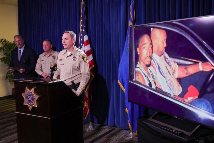 An image on a television monitor shows a photo of Tupac Shakur (L) and Marion "Suge" Knight Jr. in a car in Las Vegas the night Shakur was killed. Clark County District Attorney Steve Wolfson, Clark County Sheriff Kevin McMahill and Las Vegas Metropolitan Police Department Lt. Jason Johansson held a news conference at the LVMPD headquarters on the arrest and indictment of Duane Davis for the 1996 murder of Shakur.