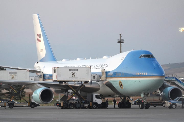 According to the reports, Trump boarded Air Force One via the stairs on the right side of the image, then hid inside a catering container on the opposite side of the plane, which took him to a different aircraft.