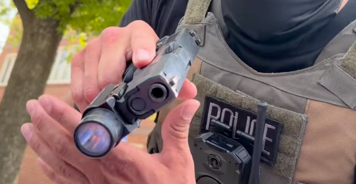 Virginia woman films ICE agent pointing gun at her in parking lot standoff