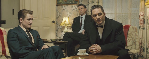 Taron Egerton, Paul Anderson andTom Hardy on the set of Legend