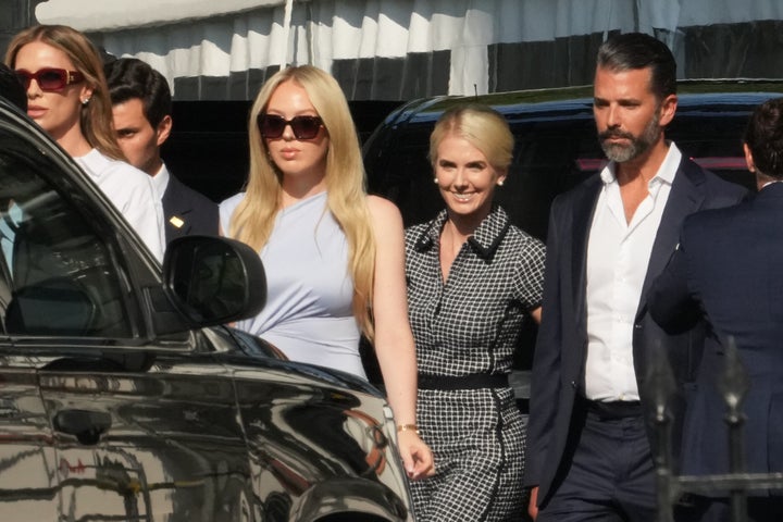 Bettina Trump, from left, Michael Boulos, obstructed, Tiffany Trump, White House aide Natalie Harp and Donald Trump Jr. walk from the North Portico of White House on July 3.