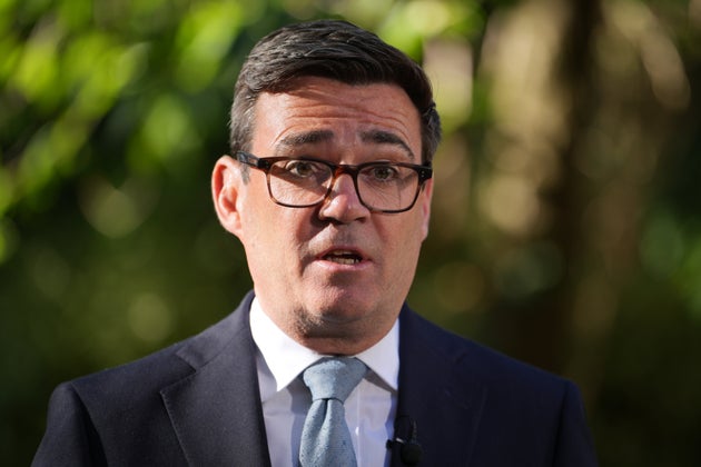 Britain's Prime Minister Andy Burnham speaks to the media after chairing a COBR meeting at Downing Street on the UK's ongoing response to extreme heat, wildfires and drought in London, Wednesday, Aug. 12, 2026