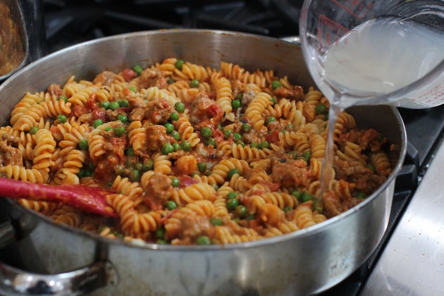 This Jan. 26, 2015 photo shows fusilli with Italian sausage, peas and creamy tomato sauce in Concord, NH. (AP Photo/Matthew Mead)