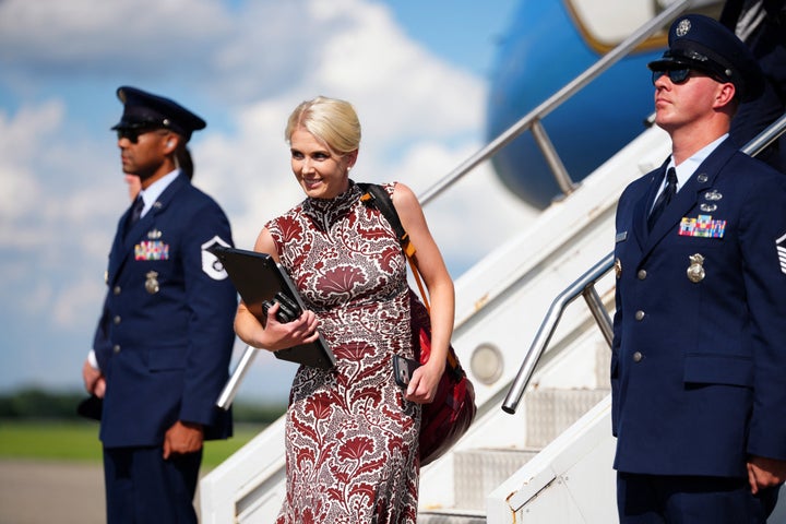 Harp is seen clutching the laptop that she often uses to type Trump’s Truth Social posts.