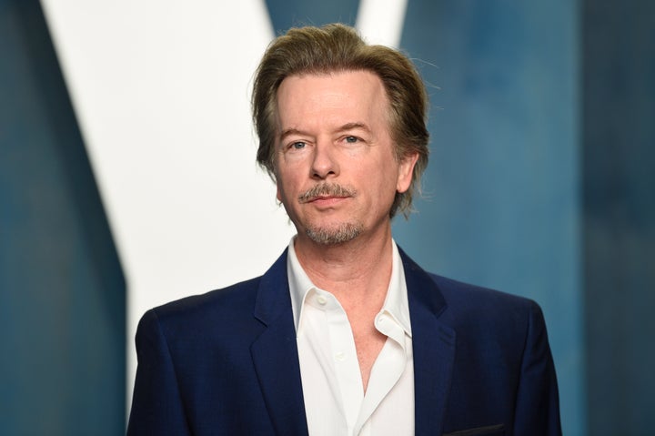 David Spade, seen here in 2022, shared on his podcast recently that he was jealous when his “Saturday Night Live” co-stars got more screen time than he did.