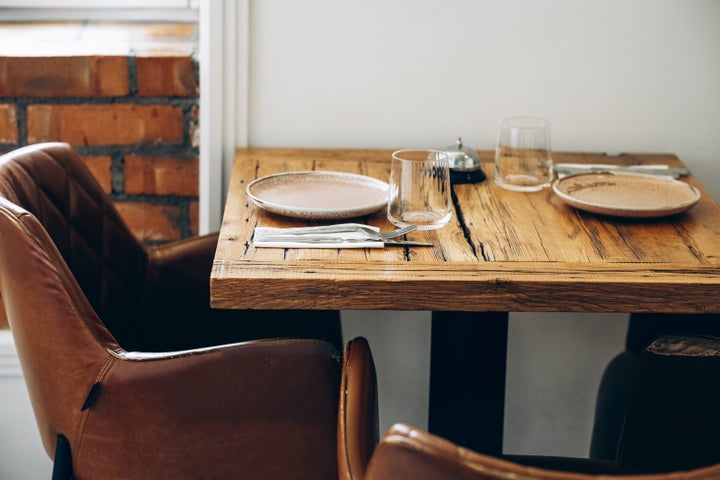A set table indicates that it’s time to eat. To avoid confusion, it’s best to only keep the table set at mealtime.