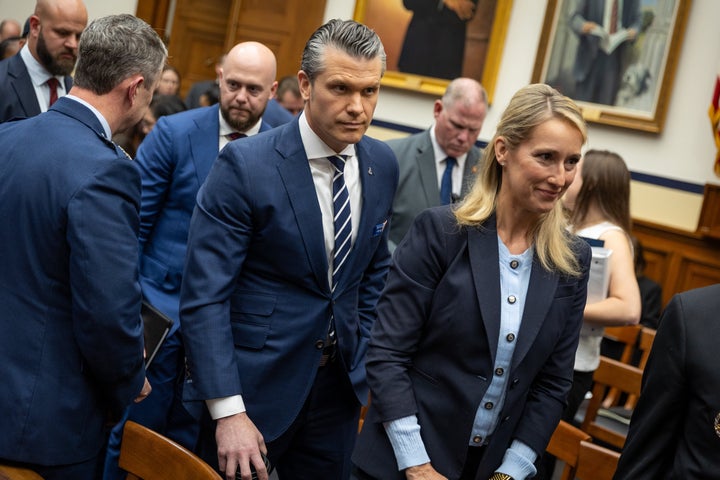 Pete and Jennifer Hegseth depart during a recess of a House Armed Services Committee hearing on the Department of Defense’s FY27 budget request in April.