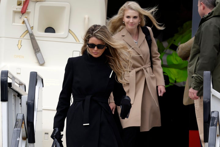Natalie Harp, rear, departs "Trump Force One" at Aberdeen Airport in Aberdeen, Scotland, on May 1, 2023.