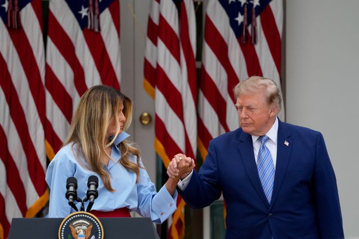 First lady Melania Trump, left, and President Donald Trump arrive for a Fostering the Future event in the Rose Garden of the White House in Washington, D.C., on Thursday, Aug. 20, 2026.
