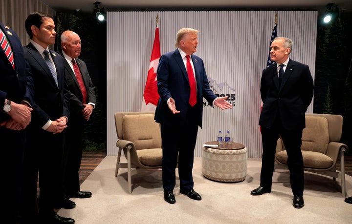 U.S. President Donald Trump and Canadian Prime Minister Mark Carney hold a bilateral meeting during the G7 Leaders' Summit on June 16, 2025 in Kananaskis, Alberta. (Photo by Chip Somodevilla/Getty Images)