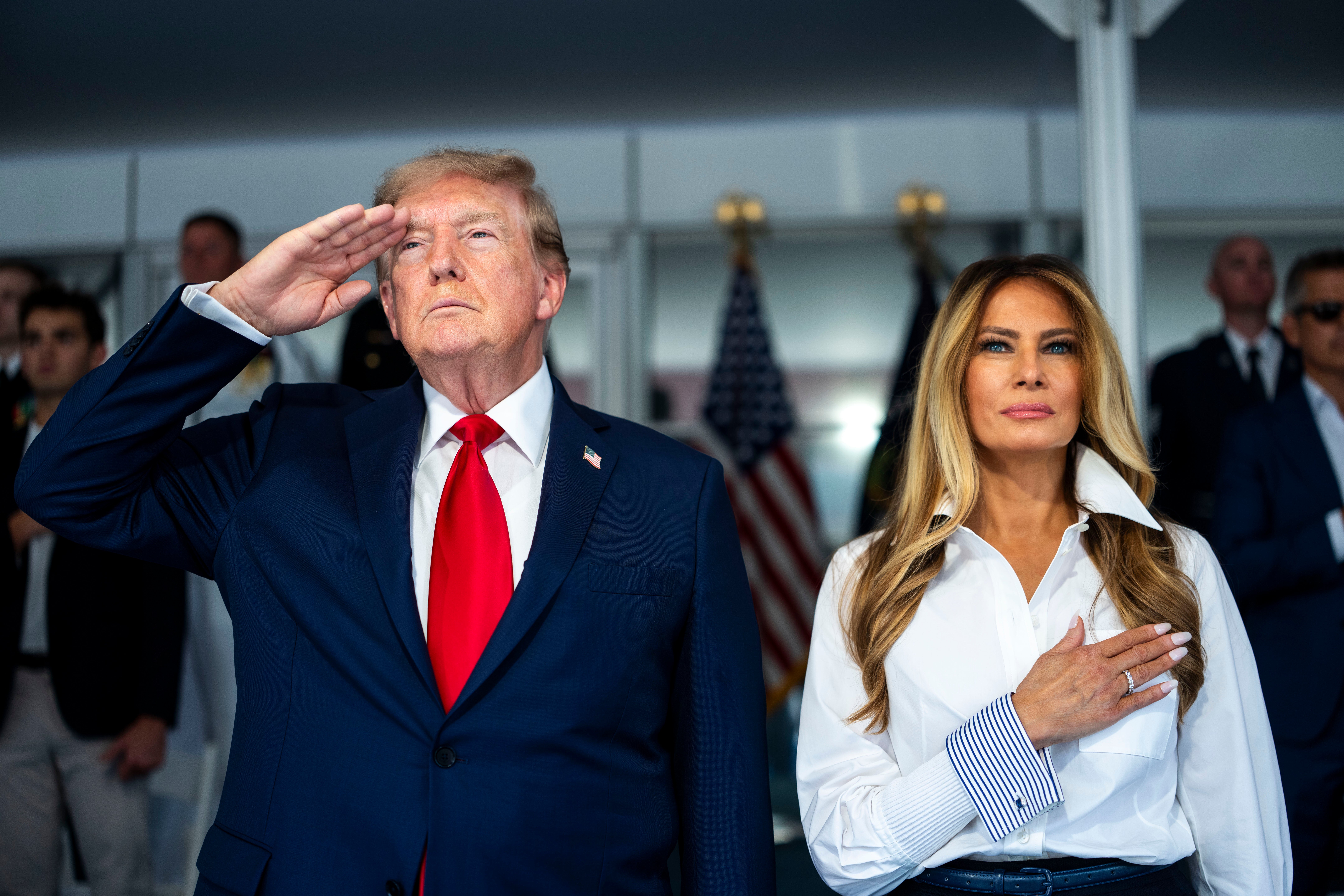 Melania Trump's abrupt walk-away from the president speaks volumes, body language experts say; she showed folded arms, tight lips, and no goodbye