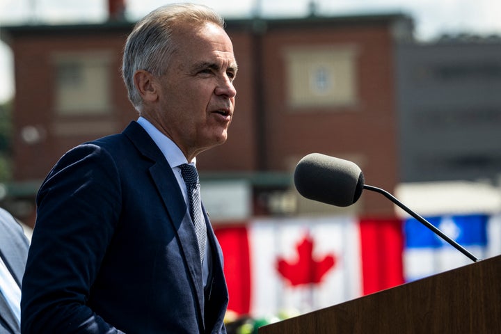 Canadian Prime Minister Mark Carney speaks about the trade dispute with the United States at the Davie Shipyard in Levis, Quebec, Canada on August 24, 2026. (Photo by ANDREJ IVANOV / AFP via Getty Images)