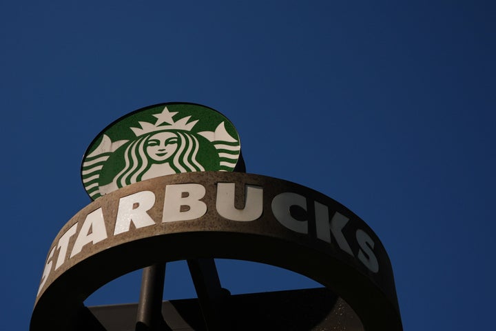 A Starbucks sign is seen outside the coffee company's global corporate headquarters in Seattle.