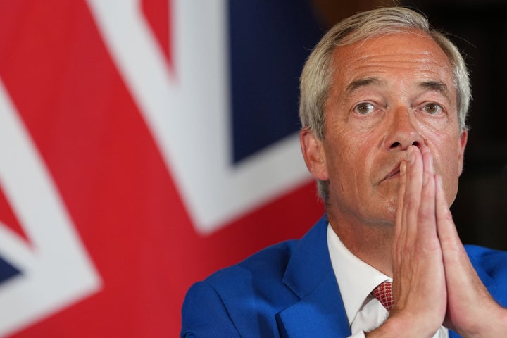 Nigel Farage, Leader of Britain's Reform UK party listens during a press conference in London, Monday, Aug. 3, 2026.