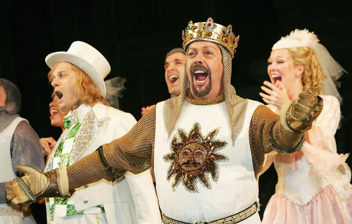 Curry sings during the opening night curtain call for "Monty Python's Spamalot" in New York on March 17, 2005.