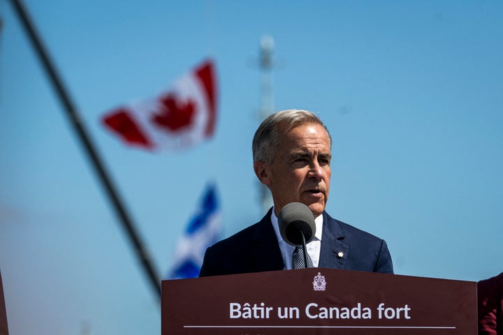 Canadian Prime Minister Mark Carney speaks about the trade dispute with the United States at the Davie Shipyard in Levis, Quebec, Canada on August 24, 2026. (Photo by ANDREJ IVANOV / AFP via Getty Images)