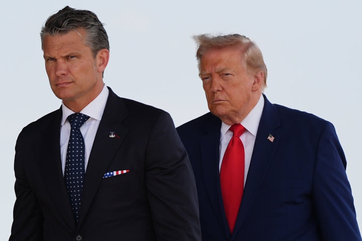 Defense Secretary Pete Hegseth and President Donald Trump attend the dignified transfer of four U.S. service members recently killed in the Middle East, Wednesday, July 22, 2026, at Dover Air Force Base, Del. (AP Photo/Julia Demaree Nikhinson)
