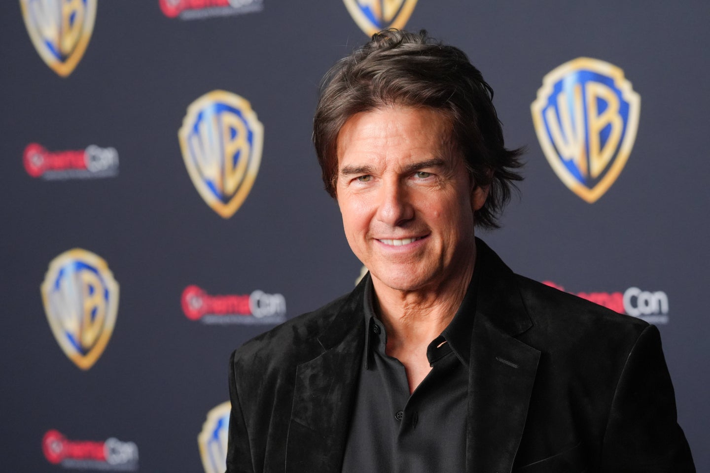 FILE - Tom Cruise arrives at the Warner Bros. presentation at CinemaCon on April 14, 2026, at Caesars Palace in Las Vega