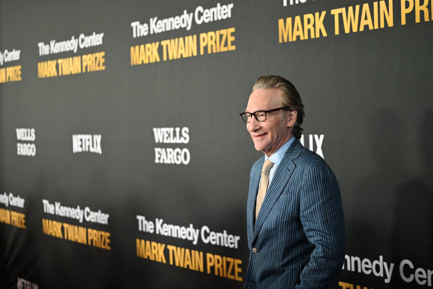 Bill Maher cracks a smile as he arrives for the 27th Mark Twain Prize for American Humor Gala at the Kennedy Center in J