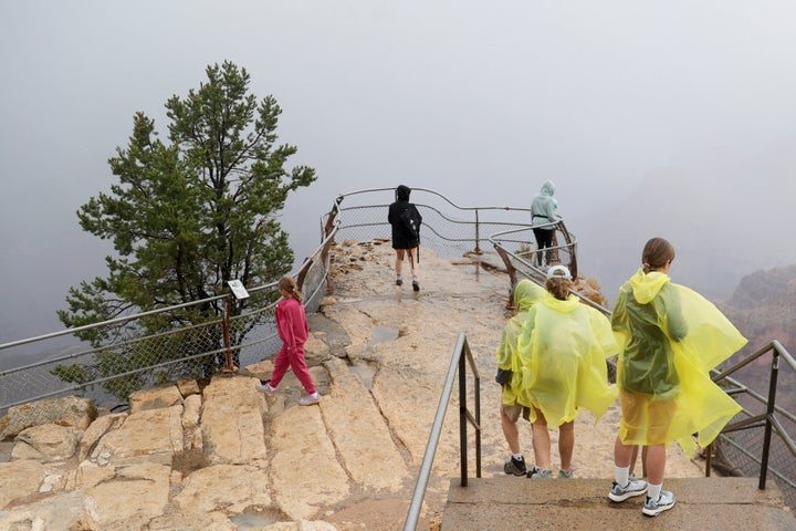 Visitors gather at a scenic overlook of the Grand Canyon on August 31, 2026.