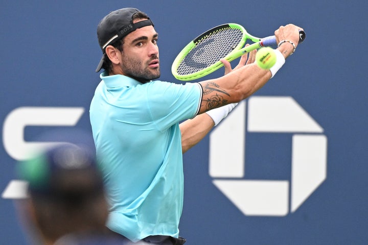 Italy’s Matteo Berrettini in action against Switzerland’s Stan Wawrinka during a men’s singles match Monday at the 2026 U.S. Open.