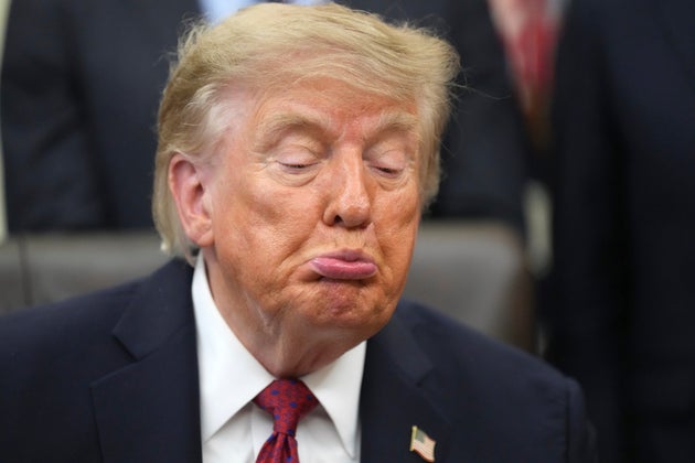 President Donald Trump reacts as a reporter asks a question in the Oval Office of the White House, Monday, Aug. 31, 2026, in Washington. (AP Photo/Jacquelyn Martin)