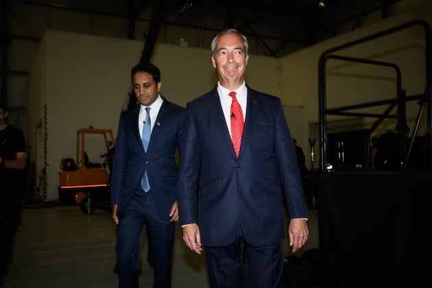 Former Reform chairman, Zia Yusuf (L), and Reform UK Leader, Nigel Farage, (R) arrive at the start of the Reform UK Deportations Policy Announcement on August 26, 2025 in Oxford, England. 