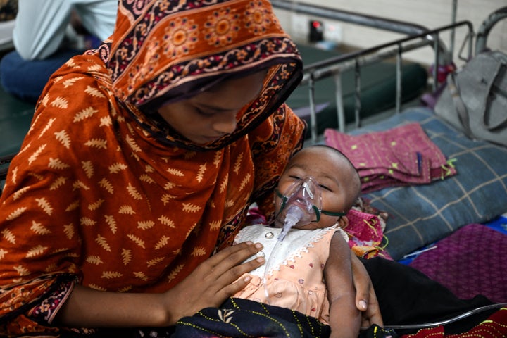 A child receives treatment for measles, at Bangladesh Shishu Hospital & Institute in Dhaka on Thursday.