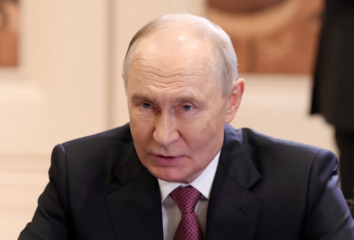 In this pool photograph distributed by the Russian state agency Sputnik, Russia's President Vladimir Putin attends a meeting with South Africa's President Cyril Ramaphosa ahead of the 18th BRICS Summit in New Delhi on September 11, 2026. (Photo by Alexander KAZAKOV / POOL / AFP via Getty Images)