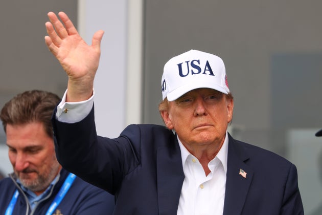 U.S. President Donald Trump waves during the Irish Open at the Trump International Golf Links in Doonbeg, Ireland.