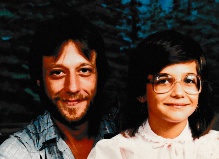 The author and her father, David, in a studio portrait session arranged by her grandmother in 1988.