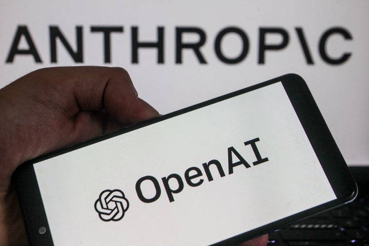 A smartphone displaying the logos of US artificial intelligence companies Anthropic and OpenAI is held in a hand, illustrating the growing competition between the two companies in the development of generative AI models and products in Tunis,Tunisia on September 13,2026. (Photo by Imen Ben Youssef / Hans Lucas / AFP via Getty Images)