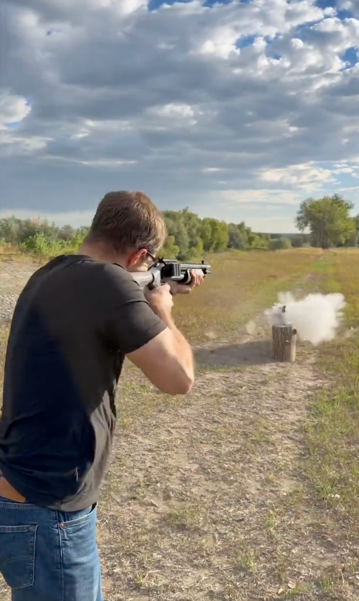 Seth Bodnar, an independent candidate for U.S. Senate in Montana, takes a shot at a security camera in a campaign ad shared to social media on Monday.