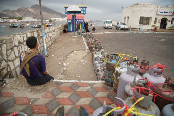 People fill their gas cans at a station in Aden, Yemen on Sept. 15, 2026. 