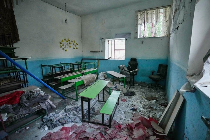 Classroom desks and chairs sit amid rubble at the Shajareh Tayyebeh school, damaged in a Feb. 28 U.S. airstrike in Minab, southern Iran, on Sept. 7, 2026. 
