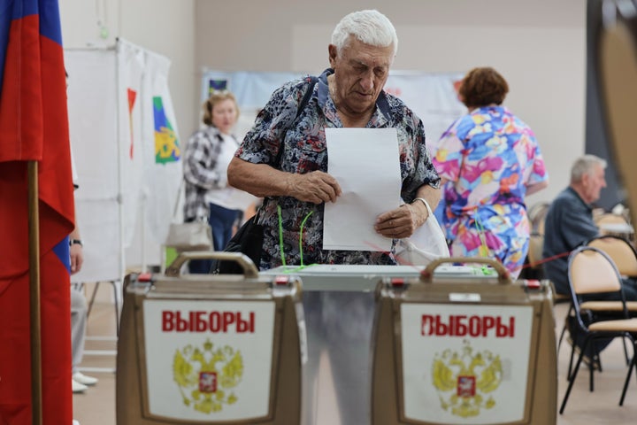 A voter casts his ballot in the parliamentary election in Vladivostok, Russia, on Sept. 18, 2026.