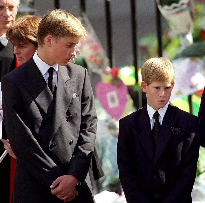 Prince William, left, and Prince Harry, right, stand outside Westminster Abbey at the funeral of Diana, Princess of Wales, on Sept. 6, 1997.