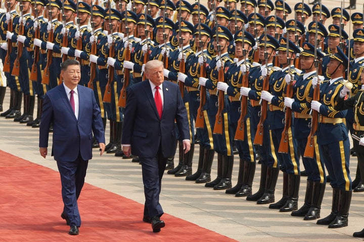 FILE - President Donald Trump, right, participates in a welcome ceremony with China's President Xi Jinping at the Great Hall of the People, May 14, 2026, in Beijing.