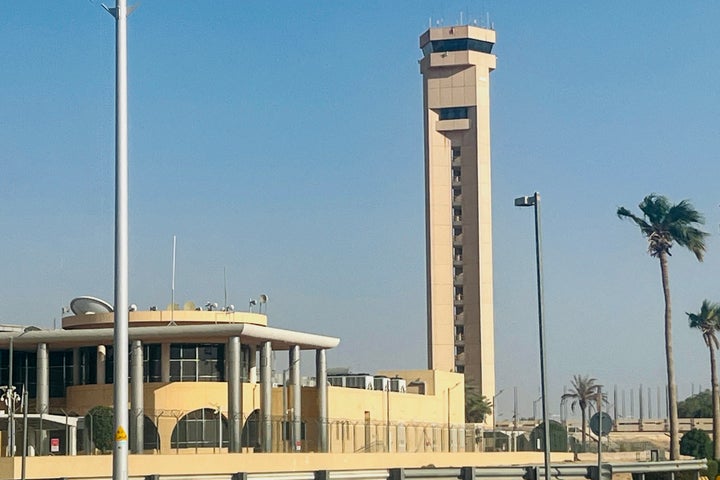 An air traffic control tower is seen at King Khalid International Airport in Riyadh on September 19, 2026. Black smoke and flames rose near Riyadh's international airport on September 19, after Saudi authorities -- fighting an escalating conflict with Yemen's Houthi authorities -- issued an air raid alert. Firefighters extinguished a blaze on fuel tank emblazoned with the logo of the Saudi oil giant Aramco at a fuel depot near the airport, according to an AFP journalist. (Photo by AFP via Getty Images) /
