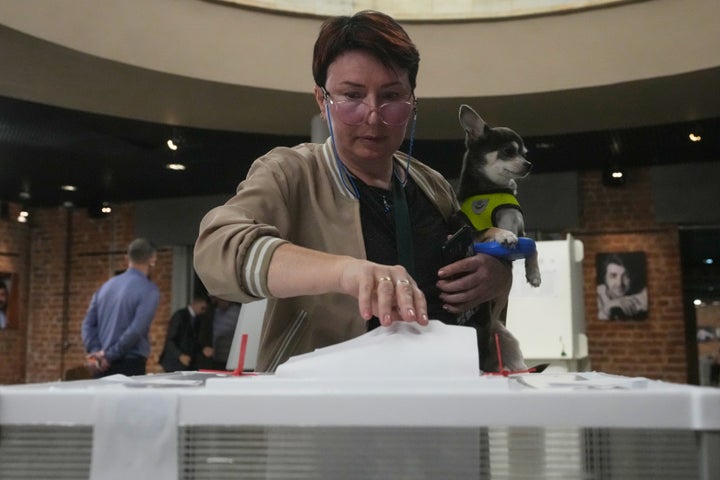 A voter casts a ballot in the parliamentary election in Moscow, on Sept. 20, 2026.