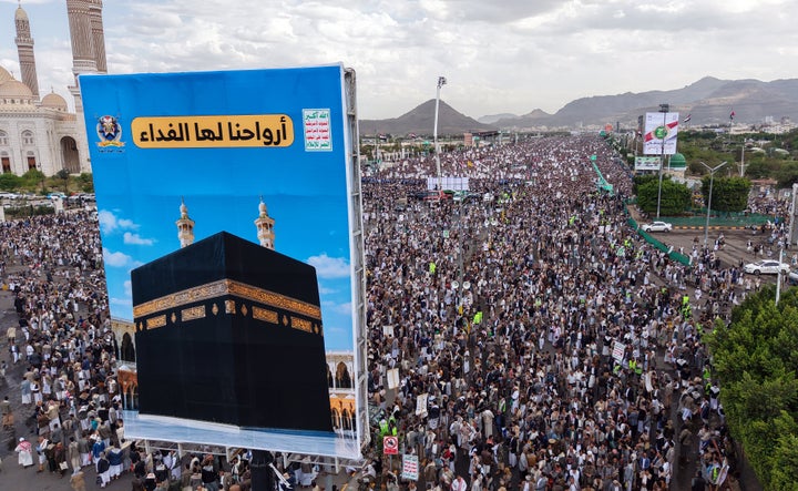 In an aerial view, Yemenis loyal to the Houthi rebels participate in a demonstration to support missile forces in protecting the country's sovereignty and to denounce the Saudi accusation that Yemenis are attempting to attack Mecca, on Sept. 18, 2026 in Sana'a, Yemen. 