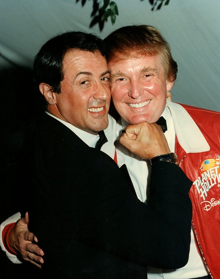 Sylvester Stallone mimes punching Donald Trump at a charity event in 1997.