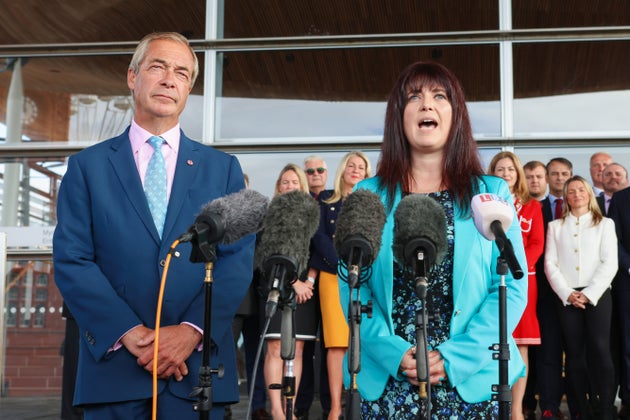 The new Welsh Reform UK Leader Helen Jenner speaks on the steps of the Sennedd beside Reform UK leader Nigel Farage, on September 21, 2026