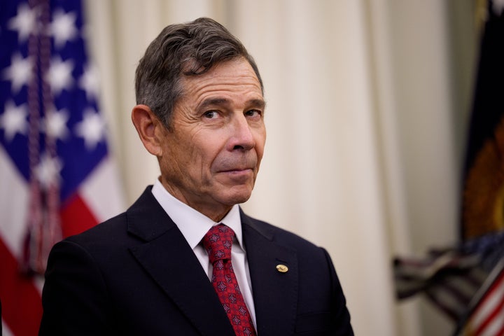 Sen. John Curtis (R-Utah) appears during an executive order signing with President Donald Trump in the Oval Office on July 13 in Washington, D.C.