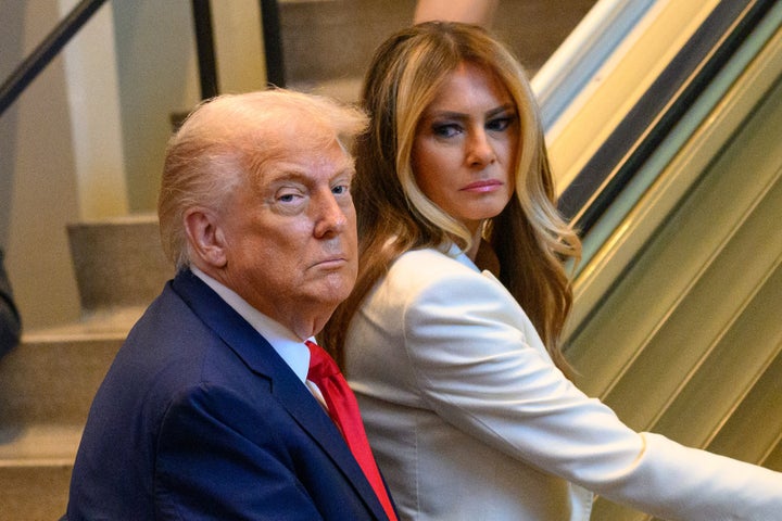Donald Trump and first lady Melania Trump step on an escalator as they arrive for the 80th session of the U.N. General Assembly in September 2025.