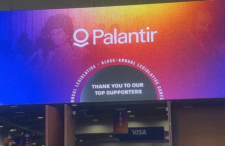 A digital banner inside the Walter E. Washington Convention Center shows Palantir and their brand logo listed among the Congressional Black Caucus Annual Legislative Conference’s “top supporters.”