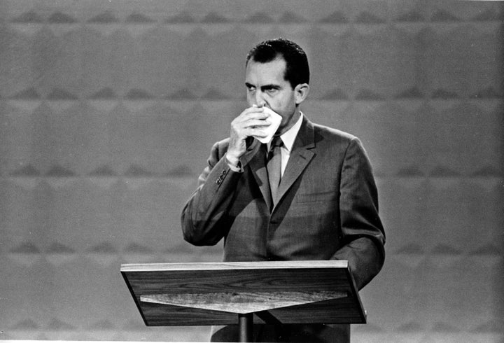 Above, then-Republican presidential candidate Richard M. Nixon is seen wiping his face with a handkerchief during the nationally televised debate. Nixon’s pale, awkward appearance became a defining symbol of his flaws. 