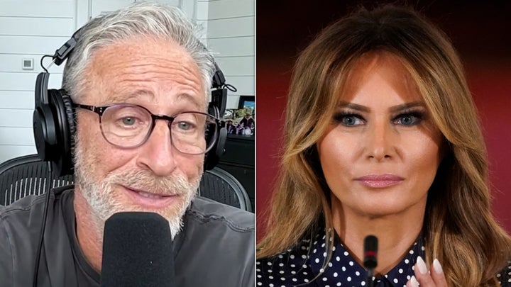 Jon Stewart and first lady Melania Trump.